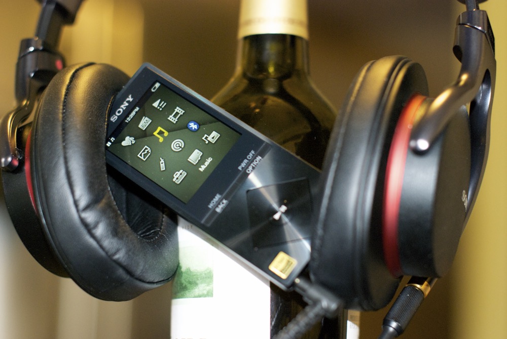 Man Using Walkman Audio Device Sony's new hi-res audio Walkman appeals to cultured senses, like a fine ...